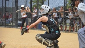 Caylan Harrison caught for the Orion Hunter Fastpitch 14U softball team in eight of the team's nine games played at the SoftballNation East Zone 14U National Tournament last weekend in Virginia Beach. Her excellent play helped the team go 9-0, winning the championship.