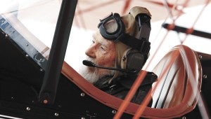 At the Spartan College of Aeronautics and Technology in Tulsa, Okla., for his 100th birthday, Suffolk native Henry Miller prepares to get airborne in a Spartan C-3 biplane, which he worked on and flew as a younger man. (James Gibbard/Courtesy of Tulsa World)