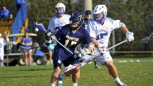 Nansemond-Suffolk Academy senior defenseman David Gough, right, earned a spot on the VISAA Division II all-state first team for the second year in a row. He was named to the all-state second team as a sophomore. (Sam Mizelle photo )