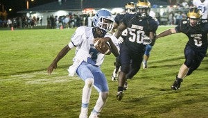 Lakeland High School freshman quarterback Tyquan Holloman and the Cavaliers will host Oscar Smith High School tonight, hoping to break the Tigers’ nearly decade-long Southeastern District win streak.