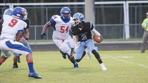 Lakeland High School freshman quarterback Tyquan Holloman and the Cavaliers will visit Western Branch High School on Friday evening to take on the Bruins.