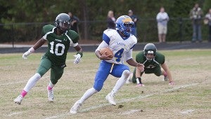 King’s Fork High School senior quarterback Ryan Kluck and the Bulldogs look to return to their winning ways tonight in their last game before the playoffs. (Caroline LaMagna photo)