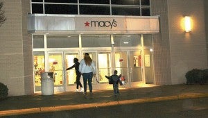 Shoppers enter the Macy’s at Chesapeake Square Mall just after its closure was announced in January. The mall is headed toward foreclosure and sale, according to a report.