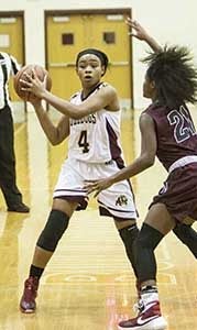 Lady Bulldog Camary Harris looks for an opportunity during a game last season. The King’s Fork High School girls’ basketball team is aiming high this year, with dreams of the state final already dancing in their heads.