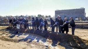 Suffolk Public Schools administrators, School Board members and City Council members participate in Friday’s groundbreaking at the new middle school.