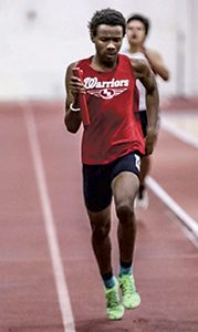 Trae Eggleston runs relay for the Nansemond River High School Warriors at Boo Williams Sportsplex. (photo by Cliff Hayes/milestat.com) 