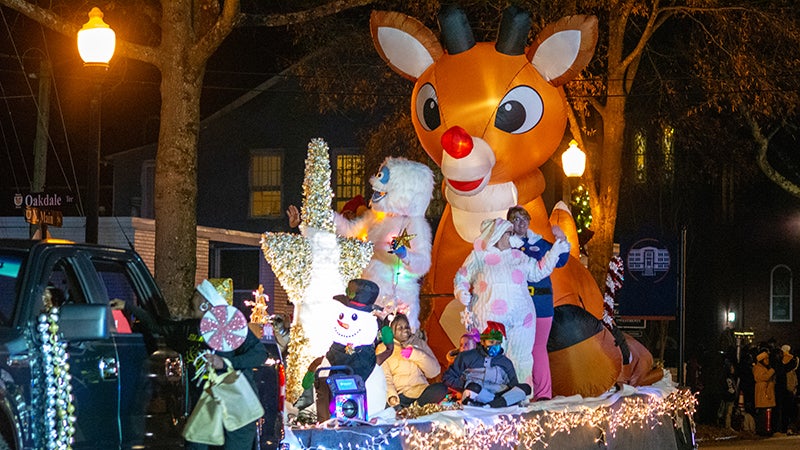 Silver and gold holiday parade draws thousands  